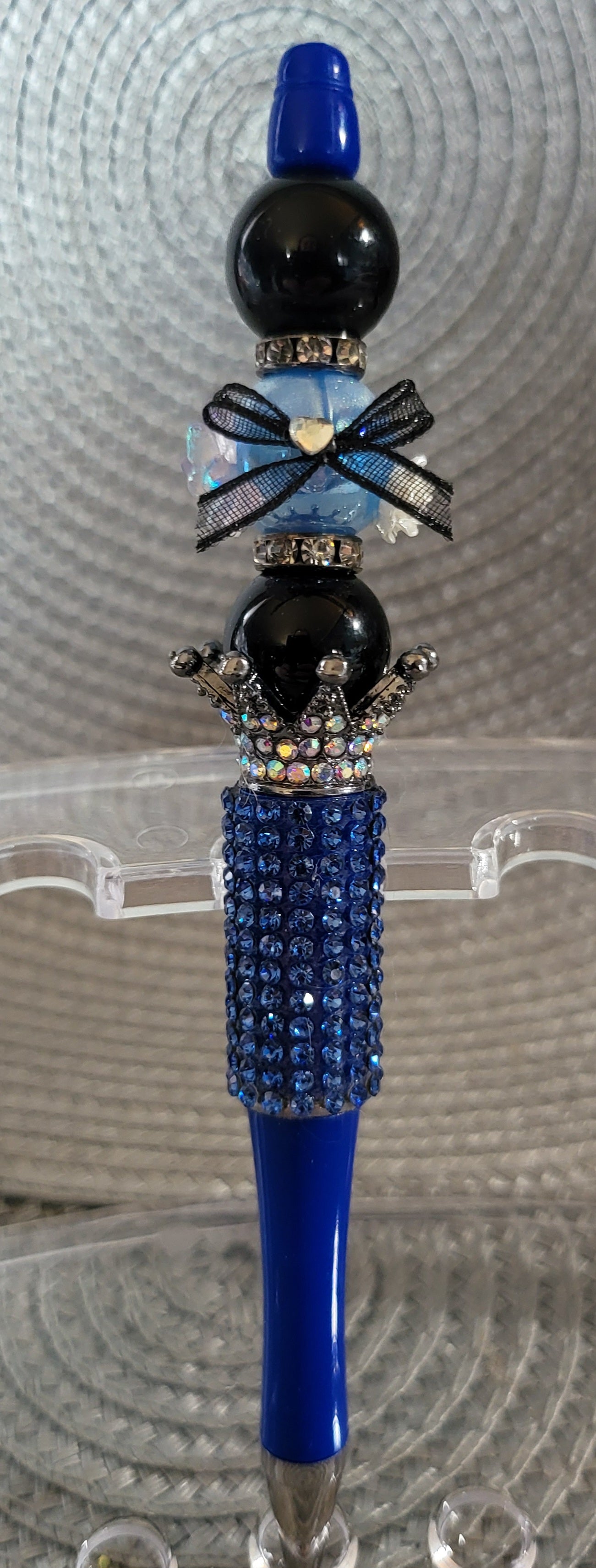 Cuenta de flores con bolígrafo con lazo