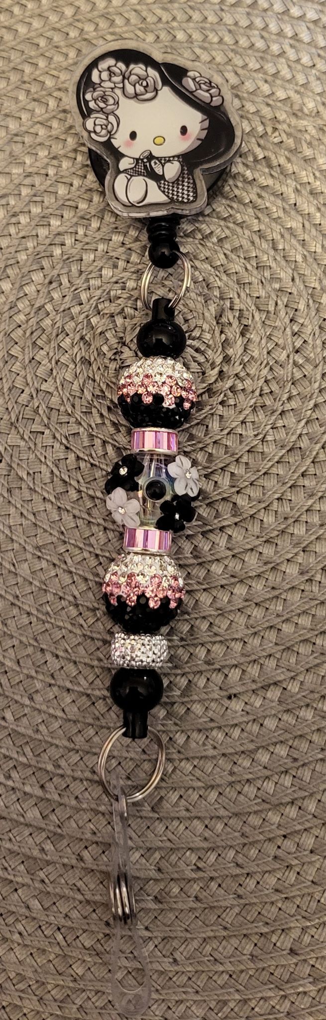 Chanel Hello Kitty Badge Reel