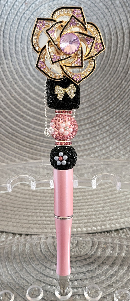Pluma de flor giratoria