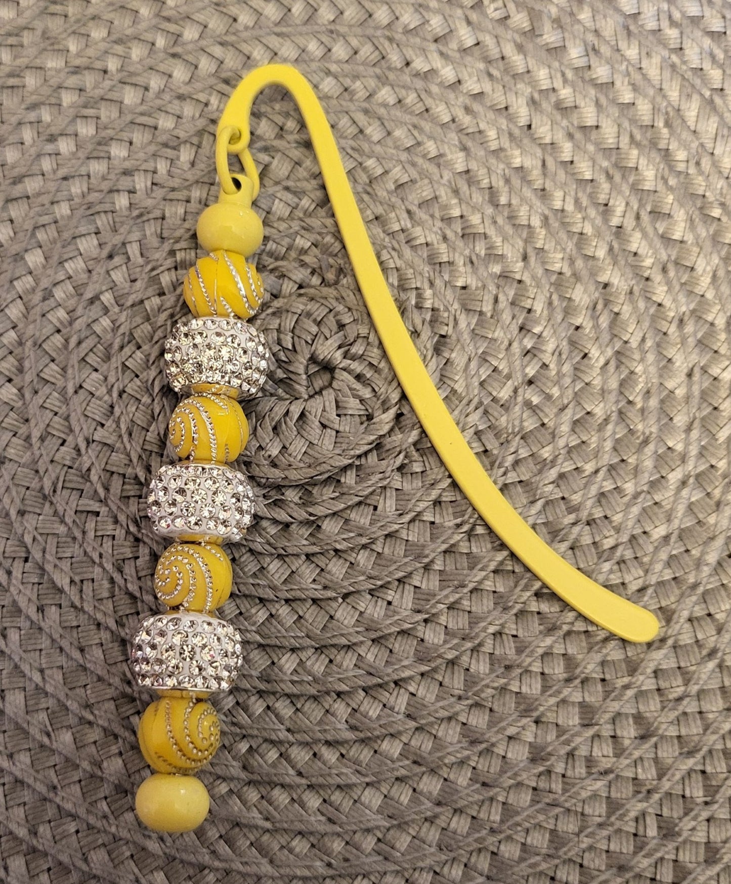 Marcador de remolinos amarillo 